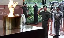 Abibilla Kudaberdiev rendering a hand salute at Amar Jawan Jyoti in New Delhi, 9 September 2011.