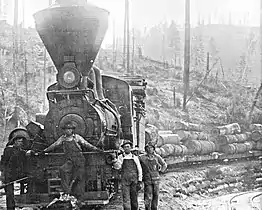 No. 5 and a load of pine logs in 1918.