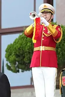 A state fanfare trumpeter of the Marching Band.