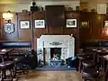 Fire place and dartboard at the Tankard Inn, Rufforth, North Yorkshire