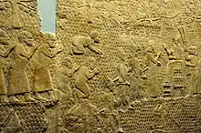 Relief depicting Sennacherib at Lachish, interacting with officials and reviewing prisoners