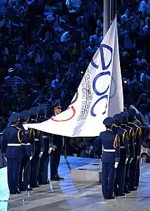 Members of the Azerbaijani National Guard raising the Olympic Flag.