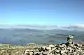 Cairn near summit with view of Clew Bay and Mayo mountains