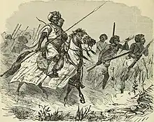 A caboceer leading his soldiers, illustration from 1877.