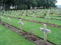 Graves of unknown French soldiers killed during World War One. Each concrete cross has a metal plaque bearing the word "Inconnu" i.e. "Unknown"