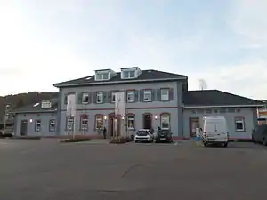 Two-story building with hipped roof