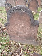 The Stone of Timothy Stanley, the oldest tombstone in the yard dating to 1648, carved by George Griswold of Windsor CT