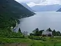 View from Tjoflot toward Kinsarvik and Lofthus in Hardanger Fjord. In the foreground the fjord splits into South Fjord and Eid Fjord.