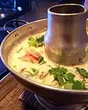 Tom kha kai at a restaurant