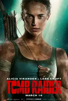 A close-up shot of a gritty-looking Lara Croft is seen with the film's title, her actress' name and company logos on the bottom.