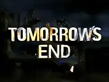 The Tomorrow's End title screen, styled in large and reflective silver letters, reflecting a large fire, title font on top of a background showing a dystopian Sydney, the Sydney Harbour Bridge in ruins,