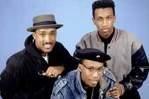 The band photographed in 1988. D'wayne Wiggins (left), Timothy Christian Riley (top right), and Raphael Saadiq (bottom).