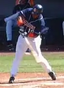 Baseball player Tony Gwynn swinging a bat