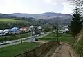 Street in Topoľa and access road to the Church of Saint Michael and communal cemetery