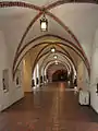 Former bread benches on the ground floor of the eastern wing, now a gallery of Gothic art