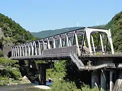 The stairs on the south side lead up to the walkway along the bridge.