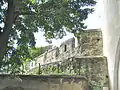 Town wall in Eggenburg showing merlons with central gun-ports.