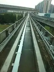 Track of Singapore LRT; the third rail is on the right side