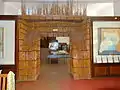 Traditional reed door leading to the Ethnography gallery