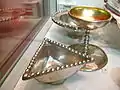 Traprain Law Treasure. Triangular silver dish, drinking  cup and bowl.