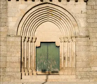 Travanca Monastery has a pointed arch portal, a feature that would later be developed in Gothic architecture.