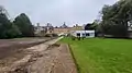 Back Lawns of Trinity looking towards Garden Quad; the white structure centre right is a temporary dining hall (2023).