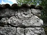 Iron Age Castro culture triskele, reused in a barn. Airavella, Allariz, Galicia