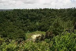 A deep dormant crater volcano