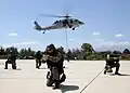 Amphibious Marines perform fast-rope exercises from a U.S. Navy MH-60S Sea Hawk helicopter during exercise Phoenix Express in 2009