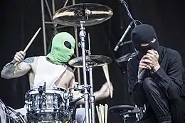 Twenty One Pilots performing.