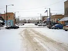 A view north on Logan Avenue in Downtown Terry, Montana during a typical snowy day.