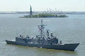 USS Boone passing the Statue of Liberty, Fleet Week, New York 2002