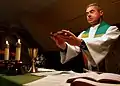 Capt. Rory MacDonald, Canadian Forces chaplain, holds Catholic Mass.jpg