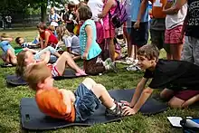 Picture of schoolchildren doing sit-ups