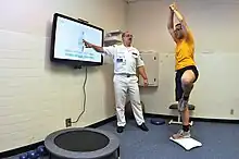 Image 136A video game is used during a physical therapy session at the Naval Health Clinic in Charleston. (from 2010s in video games)