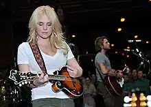 Cheyenne Kimball performing aboard the USS Abraham Lincoln (CVN-72) in 2010