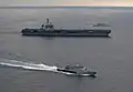 KD Kelantan (fore) with USS Carl Vinson and Kasturi-class corvette KD Lekir.