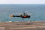 An Alouette III assigned to PNS Shah Jahan lands aboard the aircraft carrier USS George H.W. Bush in 2011.