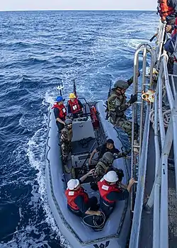 US and Pak Navy VBSS teams boards ship during a joint exercise