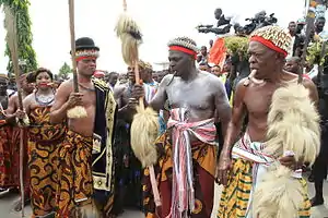 A Line of the Royal Procession, led by the Okpebili - Prime Minister, The Onun Ekoh - Defense Minister, The Obol Lopon of Ugep (the King)