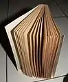 Unopened book pages, to be cut with a paper knife