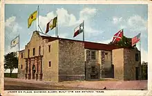 Under six flags, Alamo, San Antonio, Texas (postcard, circa 1915–1924)