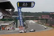 The start of an automobile endurance race at the Circuit de la Sarthe