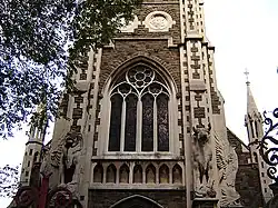 Stone winged lion and bull on either side of the main door