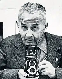 Photo of Jírů holding a camera