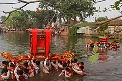 Ceremonial procession of Thành hoàng in Vân Côn village.