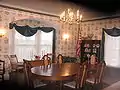 This dining room was added by Judge James' son, Burt, on the first floor, at a later date along with the third floor addition.