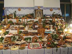 Tavolata di San Giuseppe ('St. Joseph altar') with offerings of bread in the province of Enna, Sicilia