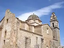 An old building with a dome and a bell tower.