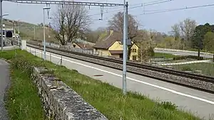 Side platform next to double-track railway line